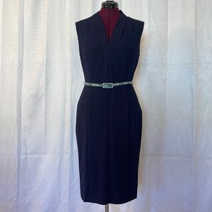 Navy blue form fitting dress.